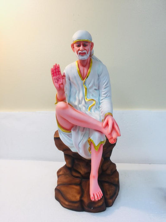 Beautiful & Colorful Fiber Statue of Sai Baba Sitting on Rock- 18.25"